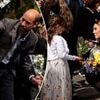 Adorable moment Prince William helps a little girl give Kate some flowers during their Isle of Mull visit