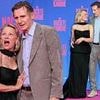 Pamela Anderson cuddles up to co-star Liam Neeson as they continue their cosy red carpet displays at The Naked Gun premiere in Berlin after sparking romance speculation