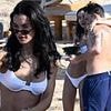 Ed Westwick and his bikini-clad wife Amy Jackson celebrate their first wedding anniversary as they pack on the PDA during lavish beach trip