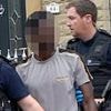Moment Border Force agents smash people smuggling ring as they arrest Gambian national in terraced family home 'who helped launder £3m in profits'