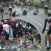 Major cycling race SUSPENDED after huge crash leaves riders bloodied and bruised amid treacherous conditions in Italy