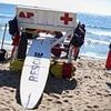 Summer horror as female lifeguard is impaled with beach umbrella on sweltering day