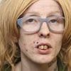 Woman, 31, who mugged her pensioner partner in broad daylight before threatening to 'knock the jaw off' a good Samaritan is jailed