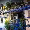 Brand na explosie bij portiekflat in Rotterdam