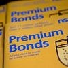 Can I give £50,000 in Premium Bonds to my four grandkids to pass on money tax free?