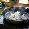 You're cooking onions wrong! Scientists reveal the secret to cooking the vegetable twice as fast - and all it takes is one unusual ingredient