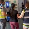 Fake doctor who became one of Interpol's most-wanted women after charging more than 600 patients for 'treatment' is arrested 5,000 miles away after going on the run