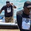 Michael Jordan receives some bad news in Greece as he's seen puffing on cigar without wife Yvette