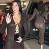 Dua Lipa goes braless and cheekily flashes her bottom in a semi-sheer dress as she leaves 50th Chaplin Award Gala in New York