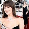 Dakota Johnson wows in plunging strapless dress for prize-winning night at Karlovy Vary International Film Festival as her European trip continues after Chris Martin split