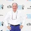 Veteran broadcaster Michael Buerk slams 'white saviour' criticism of Live Aid: 'If you're dying of starvation, you're not really that concerned about the colour of the person saving you'