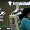 Asian shares charge higher after US stocks rally
