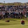 Buried ball baffles McIlroy in wild ride for hometown hero at British Open