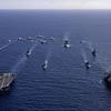 Britain and America's show of strength to China: UK and US aircraft carriers steam through Pacific in display of combined military might amid mounting tensions with Beijing