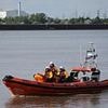 Police resume search for missing nine-year-old girl who vanished into Thames in front of her parents after her brother was plucked to safety