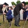 Delighted Tony Hudgell, 10, is greeted by Prince William as double amputee FINALLY manages to attend Buckingham Palace garden party - after getting stuck in traffic last year