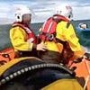 Dramatic moment unconscious woman is rescued by RNLI volunteers after being swept out to sea