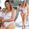 Iskra Lawrence shows off her figure in a blue Cupshe swimsuit as she struts the runway at Miami Swim Week with her baby daughter Prima