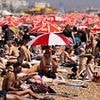 UK will be even hotter tomorrow: Temperatures could hit 35C as amber health alert is extended across England after sunseekers flocked to the coast as 'killer' heatwave gripped Britain