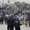 200 arrested in France as protesters clash with police, as Macron installs new PM