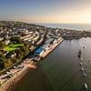 Massive 100-strong adults-versus-teenagers beach fight sees boy attacked by four weapon-wielding grown-ups