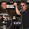 Liam and Noel Gallagher are hand-in-hand as they kick off first night of Oasis' hometown stint at Manchester's Heaton Park - as the city descends into chaos