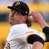 Taillon shines, Busch and Crow-Armstrong homer as Cubs beat Pirates 4-0 to close on playoffs berth