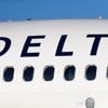 Delta plane wing clips empty aircraft during pushback from gate in Atlanta