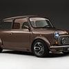 The classic Mini turned into a £75,000 hot hatch - and the first model built has been sold to... a model