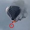 Horror moment man falls to his death after dangling from burning hot air balloon