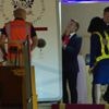 Macron says he and wife were horsing around when she appears to push the French leader