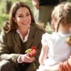 William and Kate join children on island nature trail