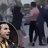 Topless Championship football star is dragged away from bloody 'street brawl' after 'pub row' stopped traffic