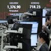 Asian shares slip as worries about U.S. debt send Wall St tumbling