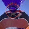 Terrifying moment tourists scream as packed hot air balloon slams into another during take off after powerful gust of wind