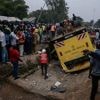 A bus carrying mourners from a funeral overturns in Kenya, killing 25 people