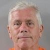 Brit holidaymaker staying near Disney World is arrested for attempted murder 'after trying to drown daughter-in-law in resort swimming pool in row over his will'