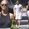 Gwyneth Paltrow is bra free in a skimpy top during tense walk with husband Brad Falchuk in the Hamptons