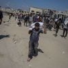 Dans la bande de Gaza, un camion de vivres se retourne sur la foule, faisant 20 morts, selon la défense civile
