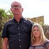 That's hardly fare! Couple return from work to find new bus stop at the end of their driveway - and buses block them when they want to get their car out