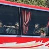 Syrian government and Kurdish-led force exchange prisoners in a step toward easing tensions