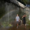 France swelters under a heat wave as fire crews guard smoldering vineyards