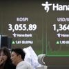 Asian shares mostly down as Trump’s tariff deadline looms and pressure steps up