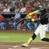 Suarez hits 32nd and 33rd homers as Diamondbacks rout Cardinals 10-1