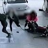 Moment undercover officers take down masked thieves who stole an off-road motorcycle as they stopped at a petrol station for fuel