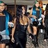 Blue haired North West, 12, gives petite mother Kim Kardashian a run for her money in the fashion stakes as they spend quality time together in Rome