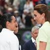Adoring pictures show the teary moment Kate Middleton broke royal protocol in the 'nicest' way at Wimbledon