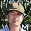 This very casually dressed Wimbledon attendee is the actor brother of a HUGE Hollywood A-lister - but can you guess who it is?