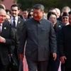 Moment Xi, Putin and Kim pose with world leaders at China's military parade