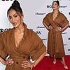 Nicole Scherzinger put on a very busty display in a plunging brown dress as she enjoys Tony Awards nominees party following 'Anna Wintour's Met Gala snub'